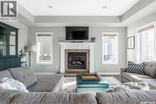 562 Evergreen Boulevard, Saskatoon, SK - Indoor Photo Showing Living Room With Fireplace