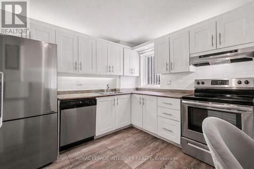 Virtually Staged Kitchen - 906 - 1081 Ambleside Drive, Ottawa, ON - Indoor Photo Showing Kitchen