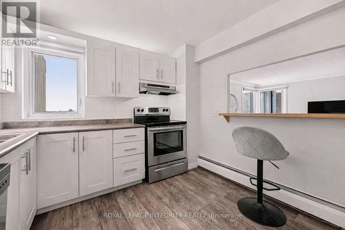 Virtually Staged Kitchen with view of Living Room - 906 - 1081 Ambleside Drive, Ottawa, ON - Indoor Photo Showing Kitchen