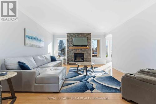 6868 Sparkling Lake Way, Ottawa, ON - Indoor Photo Showing Living Room With Fireplace