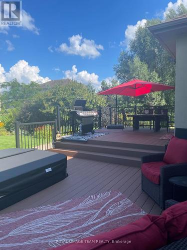 Back deck in the summer - 6868 Sparkling Lake Way, Ottawa, ON - Outdoor With Deck Patio Veranda