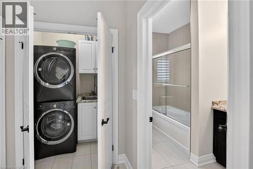Main floor stackable laundry - 1 Cedar Drive, St. Davids, ON - Indoor Photo Showing Laundry Room