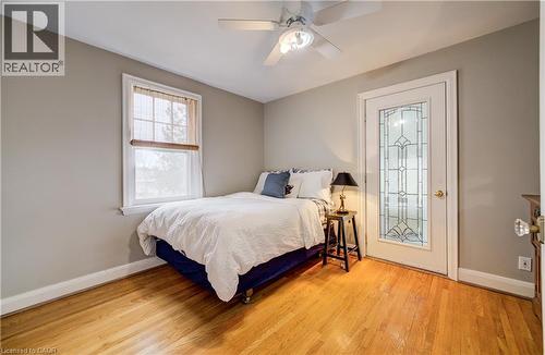 featuring sunroom access - 27 Lowrey Avenue S, Cambridge, ON - Indoor Photo Showing Bedroom