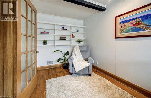 featuring built-in shelving - 27 Lowrey Avenue S, Cambridge, ON - Indoor Photo Showing Other Room