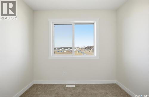 18 Taskamanwa Terrace, Saskatoon, SK - Indoor Photo Showing Other Room