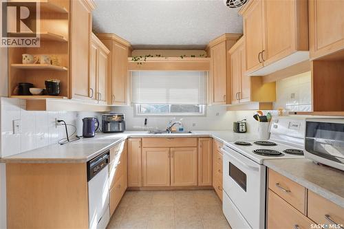 3A & 3B Bateman Crescent, Saskatoon, SK - Indoor Photo Showing Kitchen With Double Sink