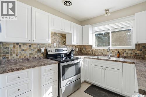 3A & 3B Bateman Crescent, Saskatoon, SK - Indoor Photo Showing Kitchen With Double Sink