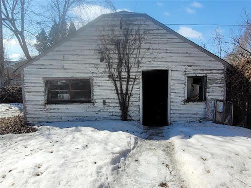 667 Countess Avenue E, Portage La Prairie, MB - Outdoor With Fireplace