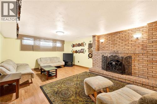 11 Pinard Street, Hamilton, ON - Indoor Photo Showing Living Room With Fireplace