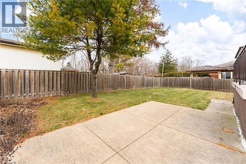 Fenced backyard with a patio area - 11 Pinard Street, Hamilton, ON - Outdoor