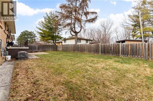 Fenced backyard with a patio - 11 Pinard Street, Hamilton, ON - Outdoor