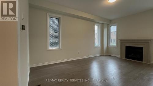 10 Molnar Crescent, Brant, ON - Indoor Photo Showing Living Room With Fireplace