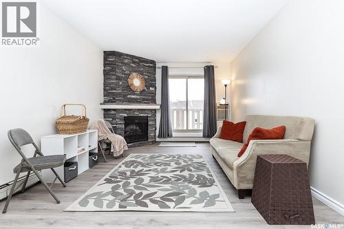 231 310 Stillwater Drive, Saskatoon, SK - Indoor Photo Showing Living Room With Fireplace