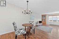 Open concept dining and living room. - 