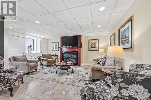 204 - 41 Sunset Boulevard, Perth, ON - Indoor Photo Showing Living Room With Fireplace