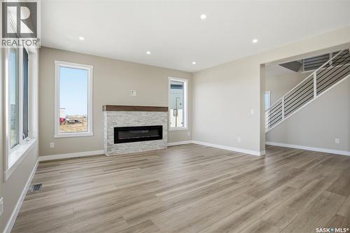 435 Sharma Crescent, Saskatoon, SK - Indoor Photo Showing Living Room With Fireplace