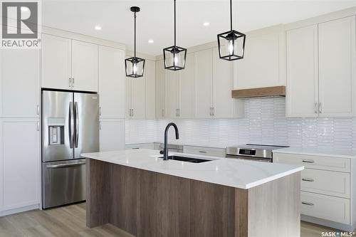 435 Sharma Crescent, Saskatoon, SK - Indoor Photo Showing Kitchen With Upgraded Kitchen
