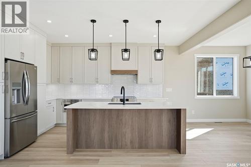 435 Sharma Crescent, Saskatoon, SK - Indoor Photo Showing Kitchen With Upgraded Kitchen