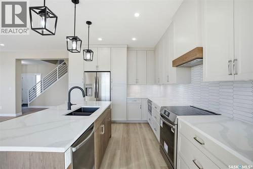 435 Sharma Crescent, Saskatoon, SK - Indoor Photo Showing Kitchen With Double Sink With Upgraded Kitchen