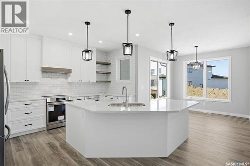 203 Sharma Lane, Saskatoon, SK - Indoor Photo Showing Kitchen With Upgraded Kitchen