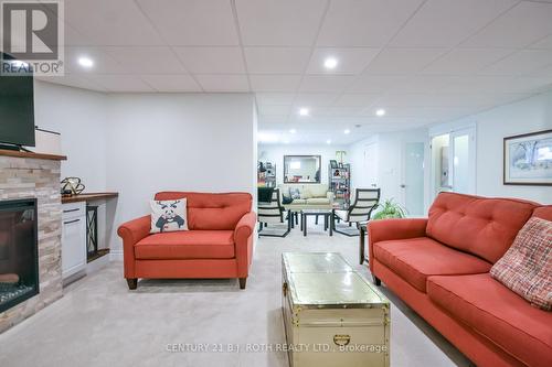 Fireplace with built ins & pot lights. - 91 Benson Drive, Barrie, ON - Indoor With Fireplace