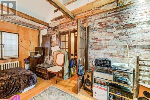 character exposed brick - 71 Margaret Avenue, Kitchener, ON - Indoor Photo Showing Other Room