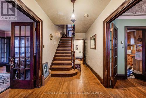 centre hall plan stairway - 71 Margaret Avenue, Kitchener, ON - Indoor Photo Showing Other Room