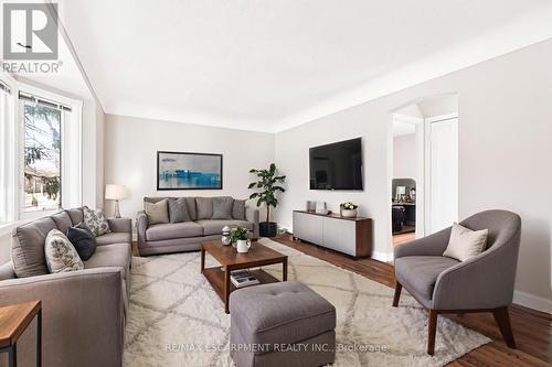 Virtually Staged - 269 Queensdale Avenue E, Hamilton, ON - Indoor Photo Showing Living Room
