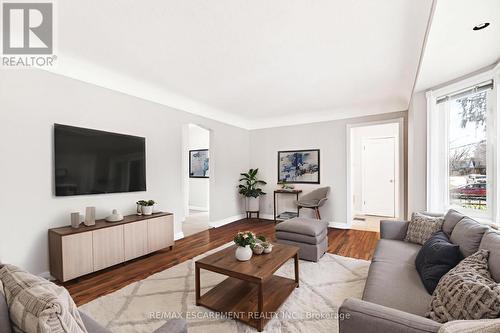 Virtually Staged - 269 Queensdale Avenue E, Hamilton, ON - Indoor Photo Showing Living Room