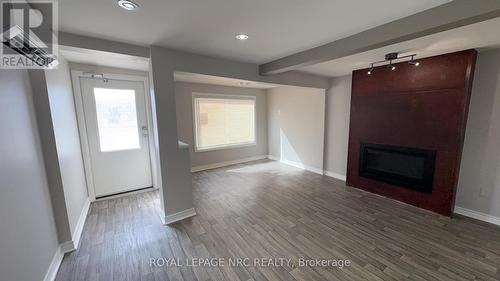 10 Thorold Road, Welland (N. Welland), ON - Indoor With Fireplace
