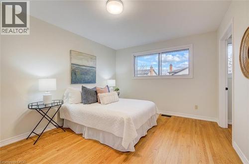 Main floor primary bedroom with ensuite privilege to the 5pc wasroom. - 66 Tupper Crescent, Kitchener, ON - Indoor Photo Showing Bedroom