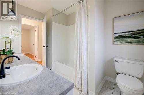 5pc bathroom with two sinks, bathtub/shower and brand new lighting. - 66 Tupper Crescent, Kitchener, ON - Indoor Photo Showing Bathroom