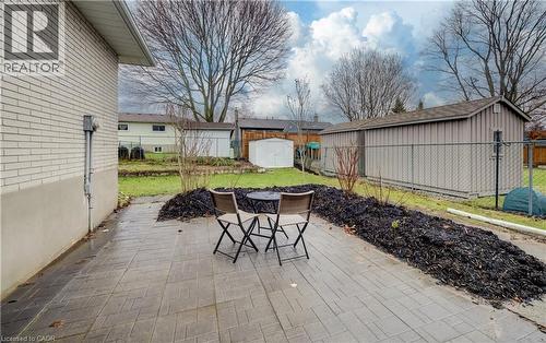Walk-out to patio with gardens to add your own touch too. - 66 Tupper Crescent, Kitchener, ON - Outdoor