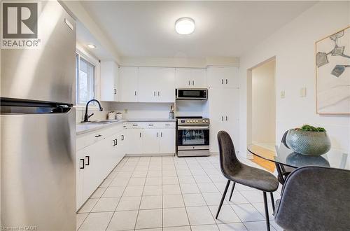 Spacious, eat-in kitchen, ample storage space, and brand new appliances. - 66 Tupper Crescent, Kitchener, ON - Indoor Photo Showing Kitchen