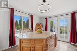 Large quartz island, walkout to patio - 