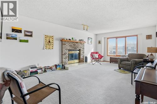 681 Canada Street, Central Butte, SK - Indoor Photo Showing Living Room With Fireplace