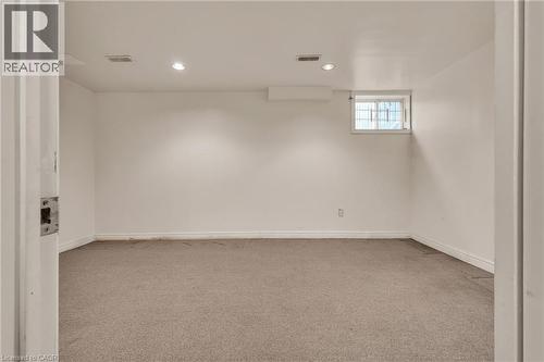 Spare room with light carpet and recessed lighting - 26 Roehampton Crescent, Guelph, ON - Indoor Photo Showing Other Room