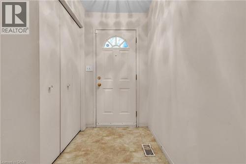 Doorway to outside featuring baseboards - 26 Roehampton Crescent, Guelph, ON - Indoor Photo Showing Other Room