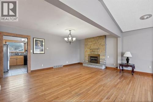 1116 Reaume, Lasalle, ON - Indoor Photo Showing Living Room With Fireplace