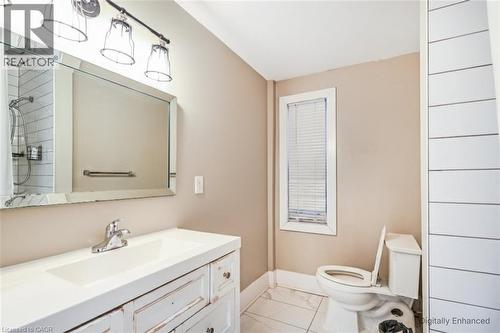 Bathroom with vanity, light marble finish flooring, and a shower - 27 Ashley Street, Hamilton, ON - Indoor Photo Showing Bathroom