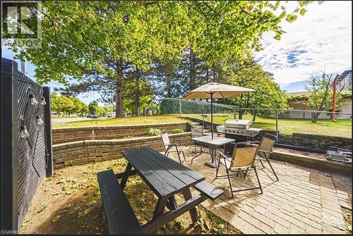 View of patio featuring outdoor dining space and area for grilling - 267 Erb Street E, Waterloo, ON - Outdoor
