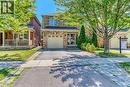 Traditional-style house with driveway and an attached garage - 3037 Abernathy Way, Oakville, ON  - Outdoor 