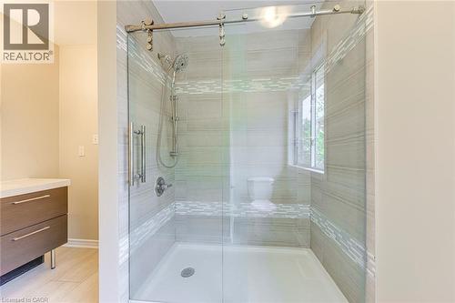 Ensuite Bathroom featuring a shower stall and vanity - 3037 Abernathy Way, Oakville, ON - Indoor Photo Showing Bathroom