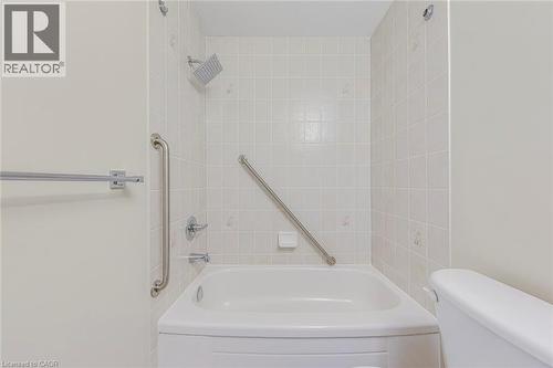 Bathroom featuring toilet and  shower combination - 3037 Abernathy Way, Oakville, ON - Indoor Photo Showing Bathroom