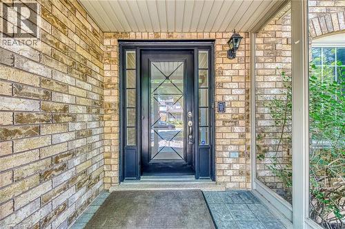 Property entrance featuring brick siding - 3037 Abernathy Way, Oakville, ON - Outdoor