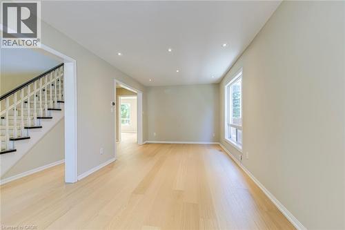Living Room/Dining Room Combination with recessed lighting and light wood-style flooring - 3037 Abernathy Way, Oakville, ON - Indoor Photo Showing Other Room