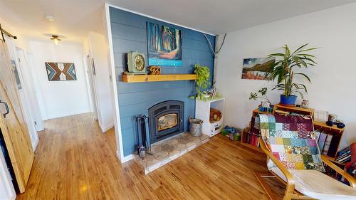 1105 10Th Street, Cranbrook, BC - Indoor Photo Showing Other Room With Fireplace