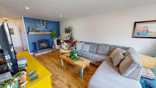 1105 10Th Street, Cranbrook, BC - Indoor Photo Showing Living Room With Fireplace