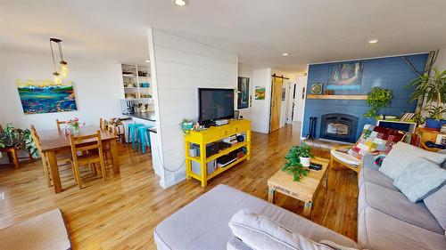 1105 10Th Street, Cranbrook, BC - Indoor Photo Showing Living Room With Fireplace