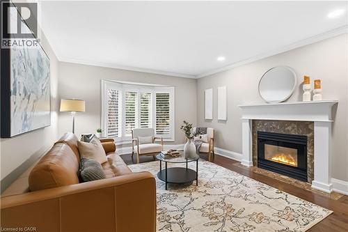 2208 Brays Lane, Oakville, ON - Indoor Photo Showing Living Room With Fireplace
